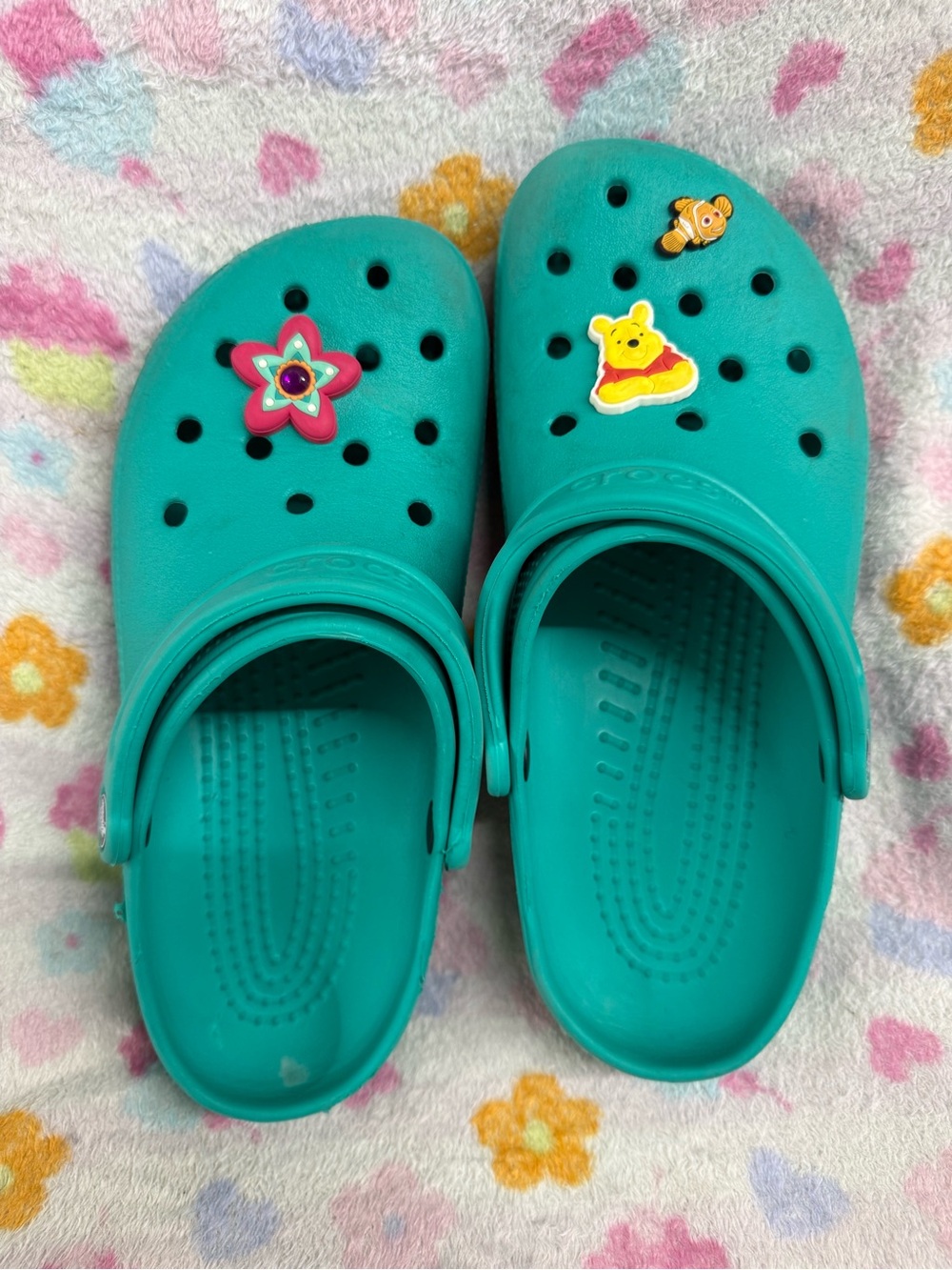 CROCS Teal Green Slip-On Clogs with Decorative Charms